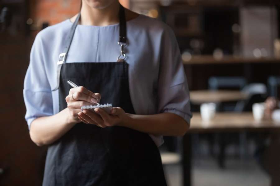 Waitress Taking Order In Hospitlaity Business