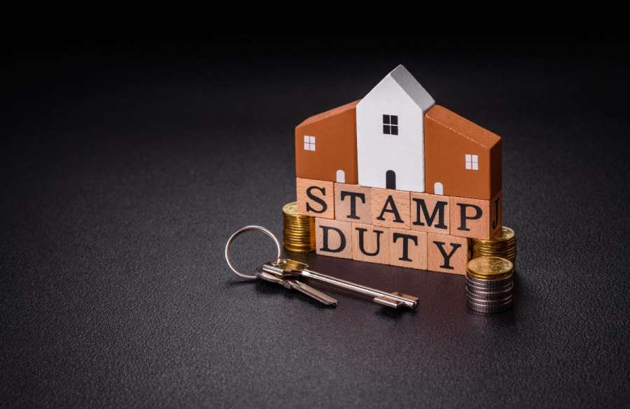 How does the Mansion Tax differ from Stamp Duty Land Tax