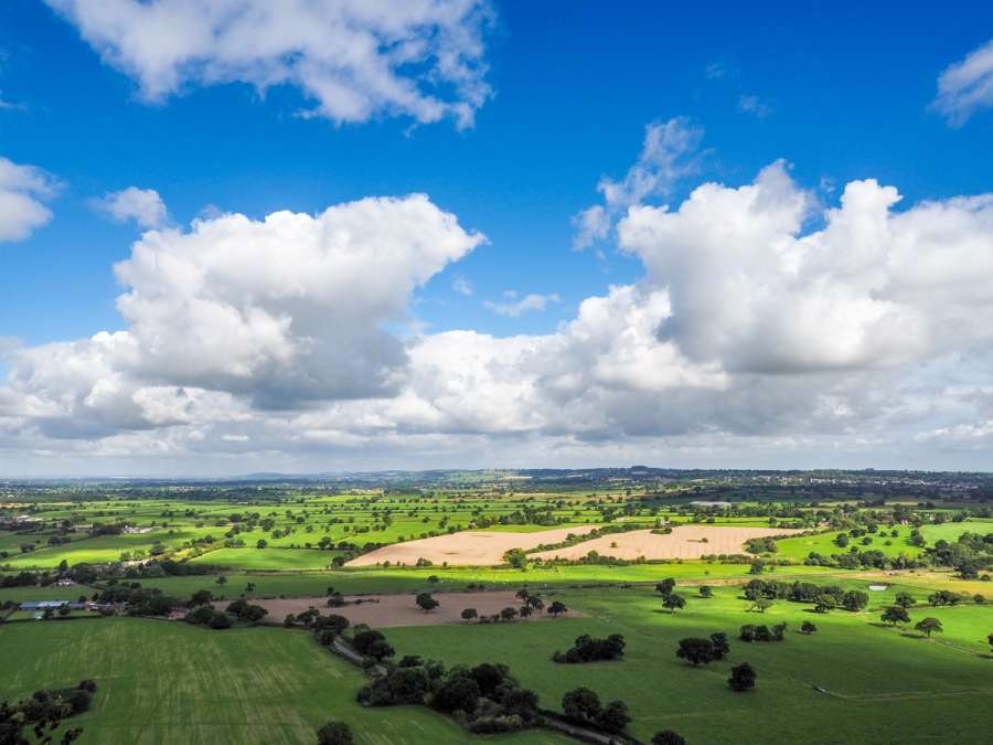 What are the advantages of transferring my farming assets to a trust